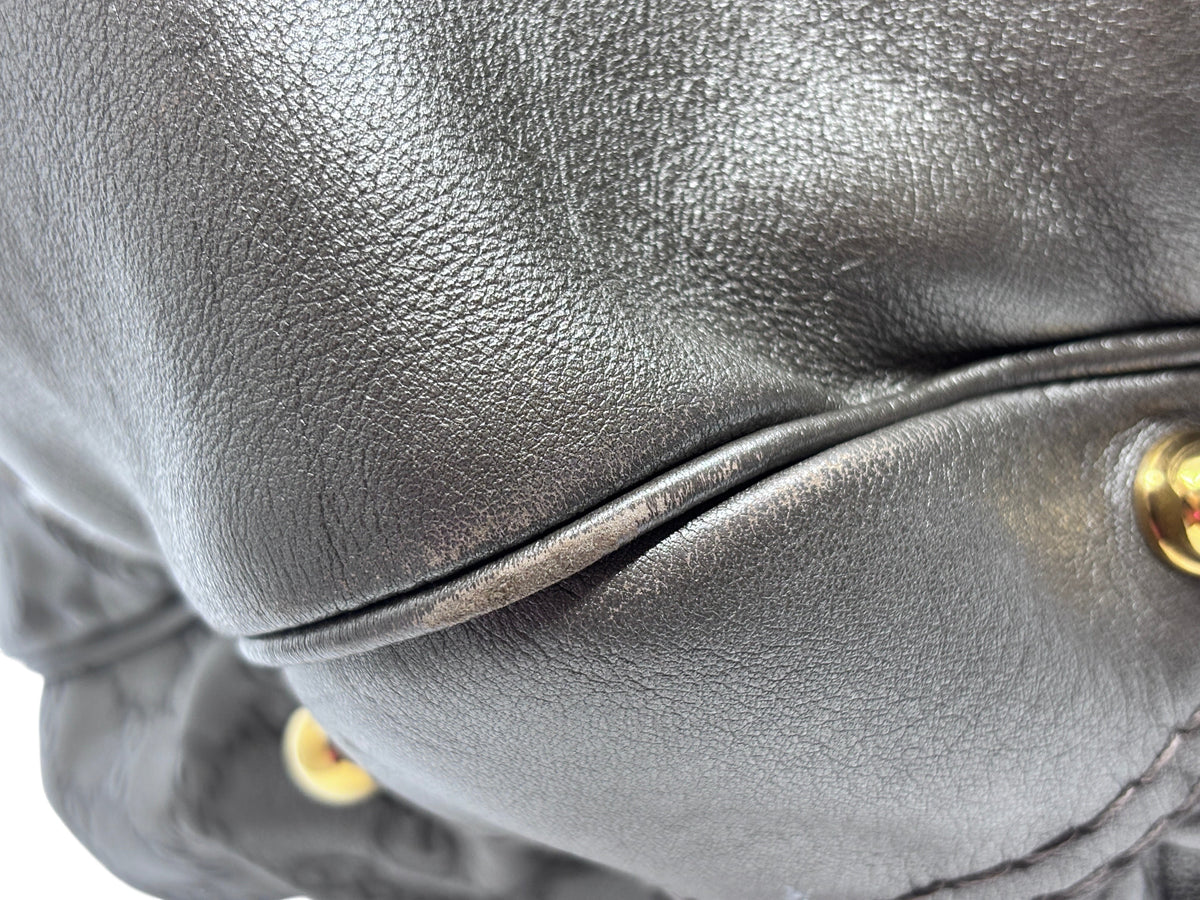 Posh Purse Co. gray Gucci Jockey shoulder bag showing close-up of leather texture, corner wear, and gold hardware