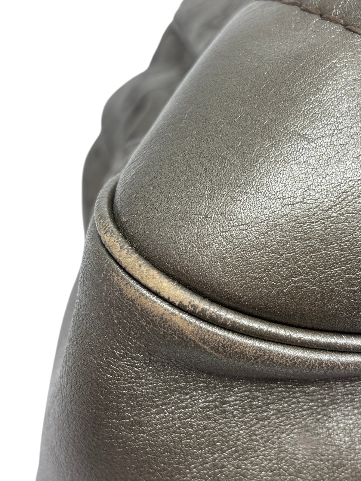 Close-up of corner wear on a gray leather Gucci Jockey shoulder bag from Posh Purse Co.