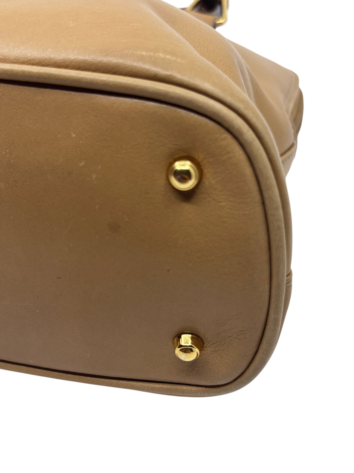 Posh Purse Co preloved Gucci leather satchel handbag base featuring polished gold tone protective metal feet