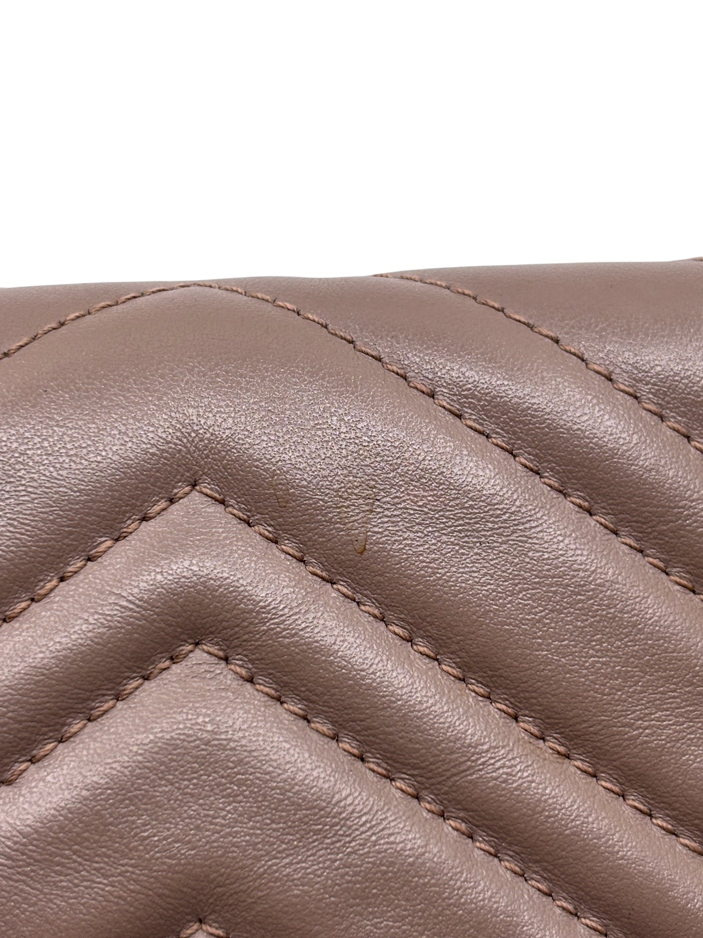 Posh Purse Co beige quilted leather Gucci Marmont bag showing chevron stitching and minor surface wear