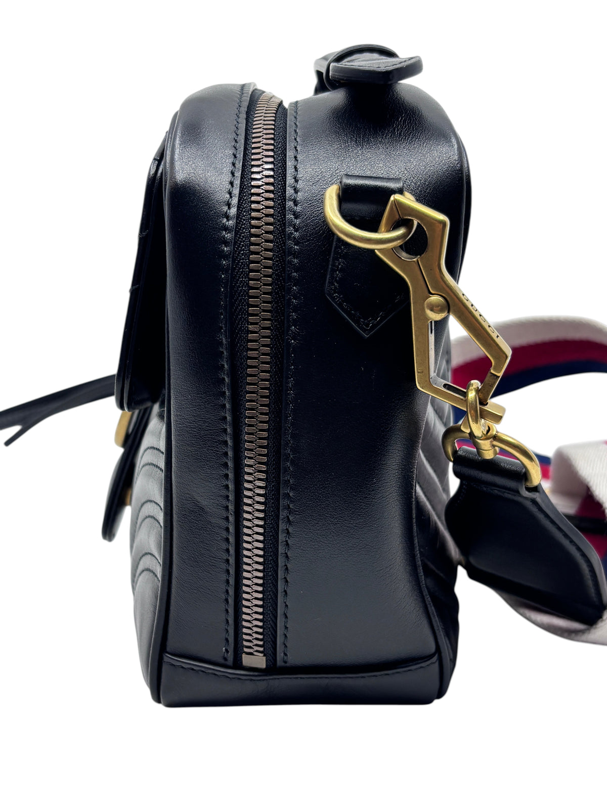 Posh Purse Co black leather Gucci Marmont crossbody bag with gold hardware and red and blue striped strap side view