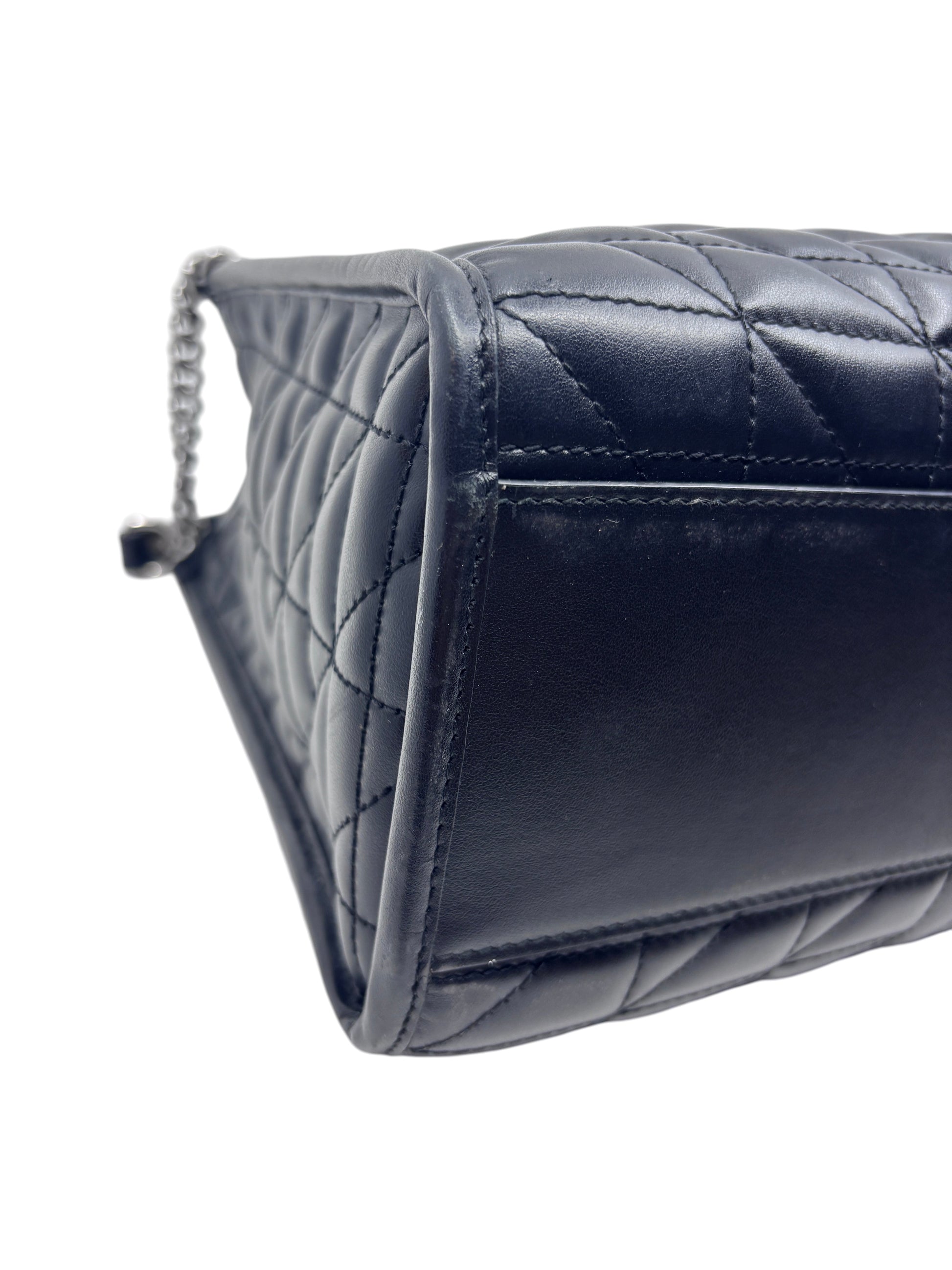 Posh Purse Co black matelassé chevron leather Gucci Marmont shoulder bag side view showing quilted texture