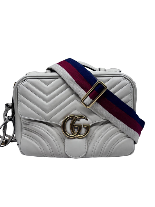 Posh Purse Co white quilted Gucci GG Marmont camera bag with signature red and blue web shoulder strap and gold logo