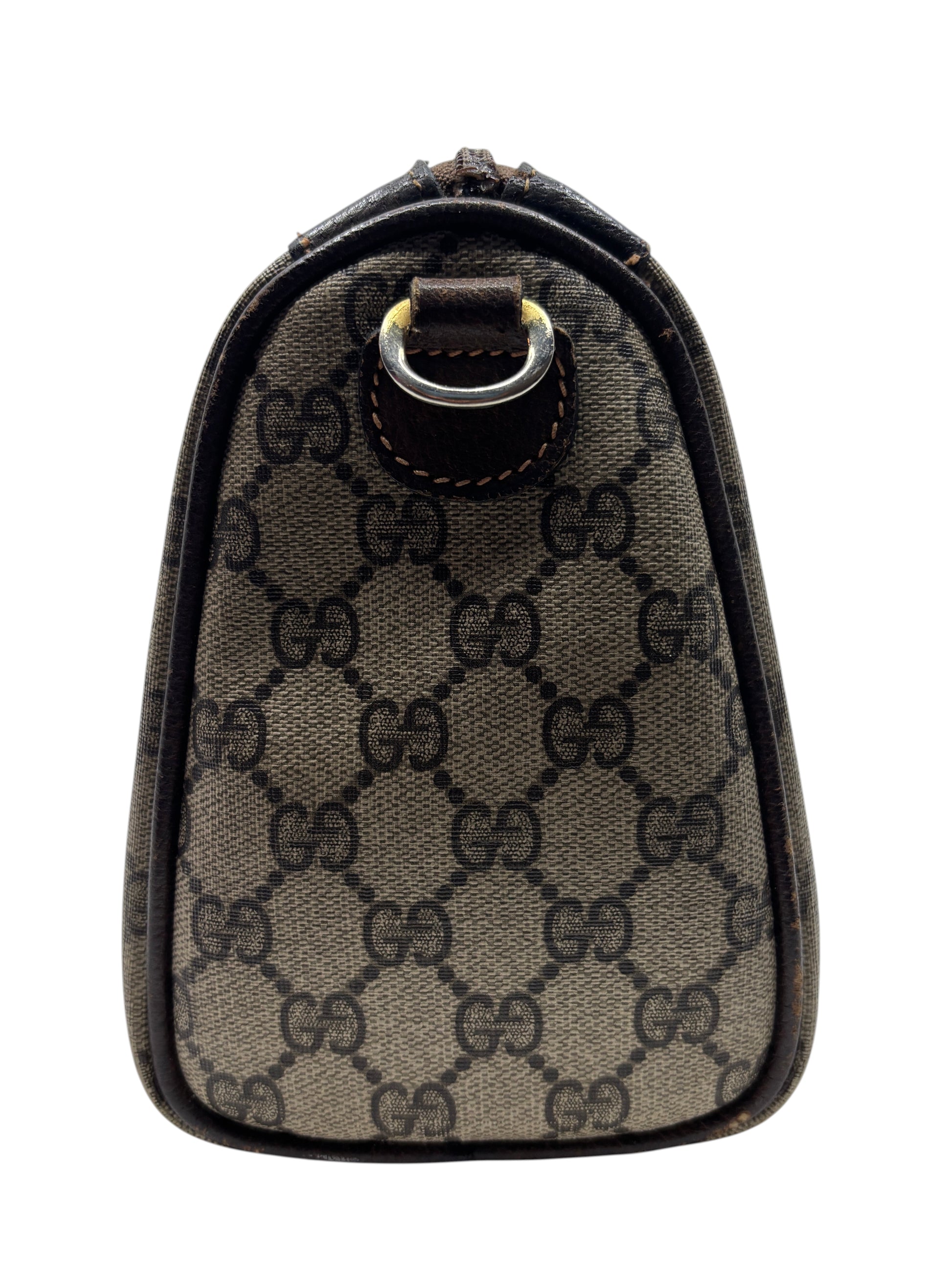 Side view of a vintage Posh Purse Co Gucci Boston bag featuring the iconic brown monogram canvas and leather trim.