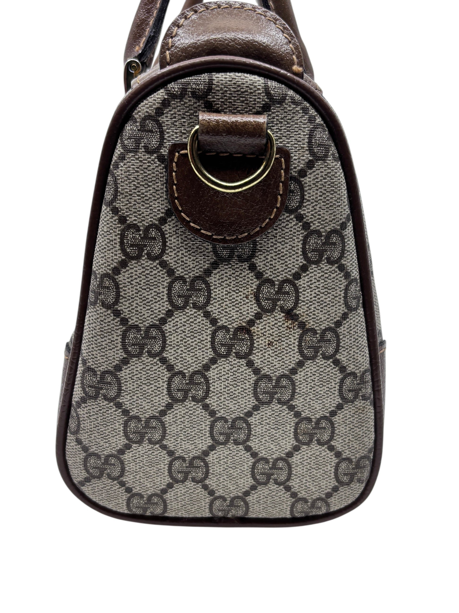 Posh Purse Co vintage Gucci Boston bag side view featuring iconic GG monogram canvas and brown leather trim