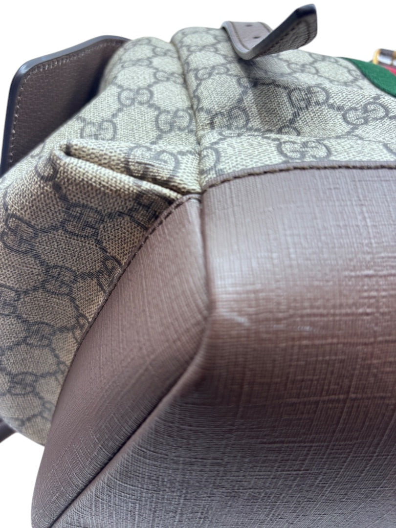 Posh Purse Co Gucci GG Supreme Ophidia backpack corner detail showing monogram canvas and brown leather trim