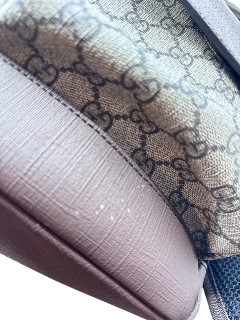 Posh Purse Co preloved Gucci GG Supreme Ophidia backpack featuring iconic monogram canvas and textured trim detail