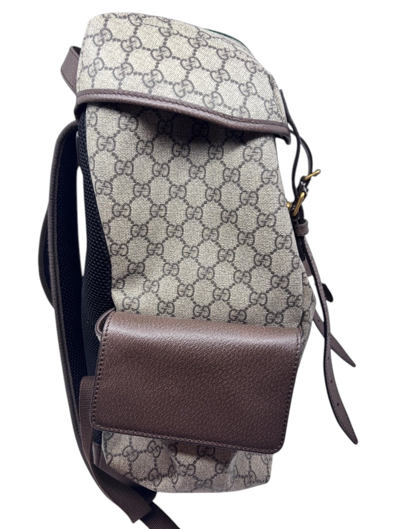 Posh Purse Co Gucci GG Supreme Ophidia backpack in monogram coated canvas with brown leather trim and side pocket