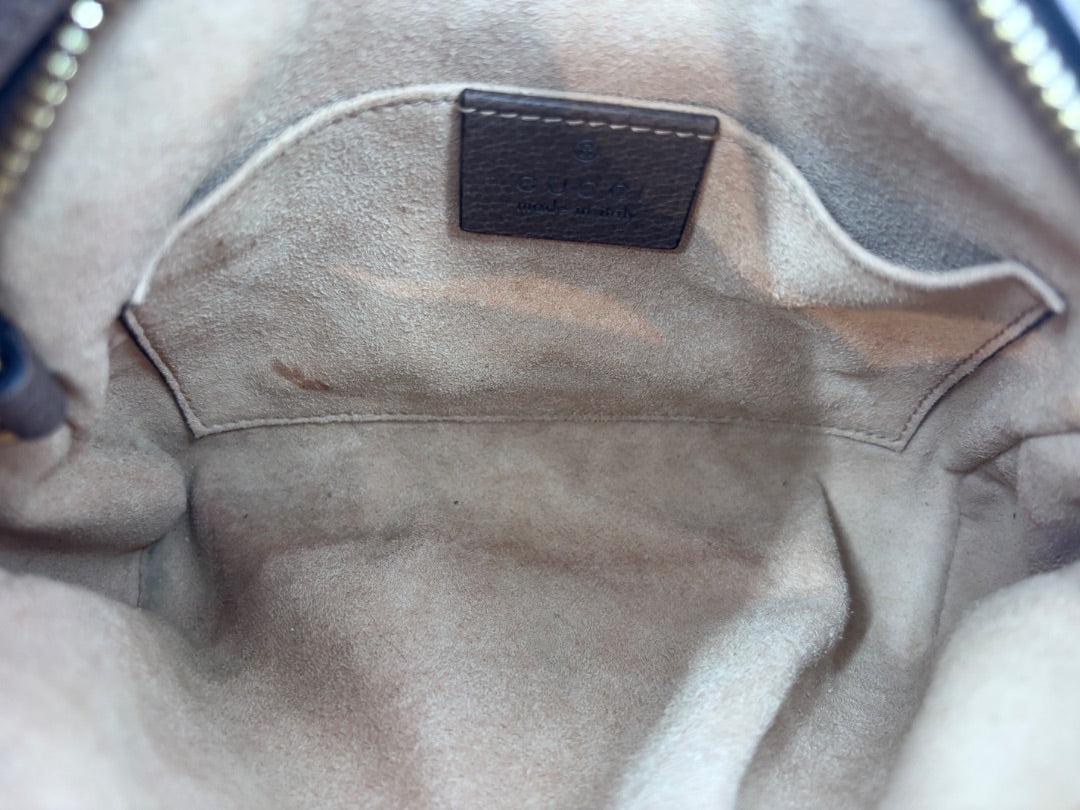 Posh Purse Co preloved Gucci GG Ophidia shoulder bag interior showing suede lining and embossed leather logo tag