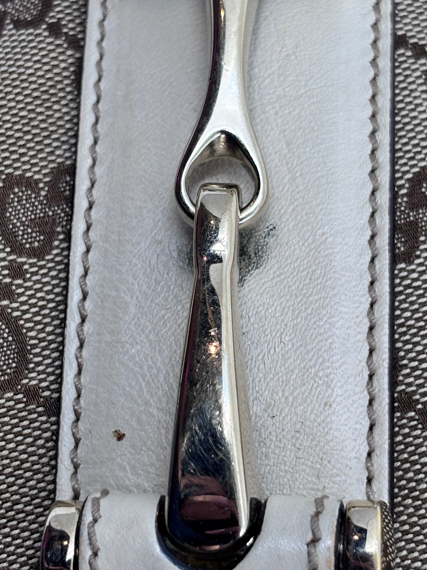 Posh Purse Co authentic Gucci Pelham handbag featuring signature silver-tone horsebit hardware detail on white leather.
