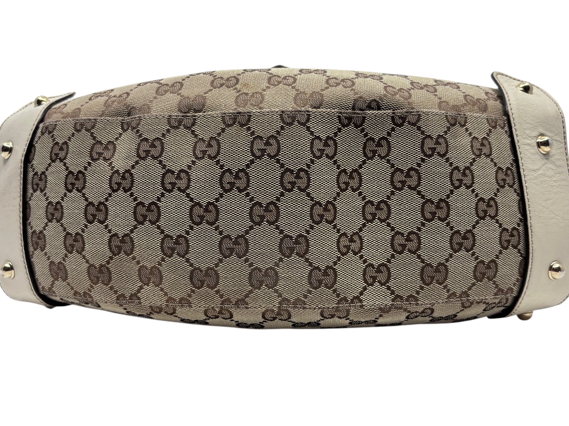 Posh Purse Co preloved Gucci Pelham handbag featuring iconic brown monogram canvas and cream leather side panels.