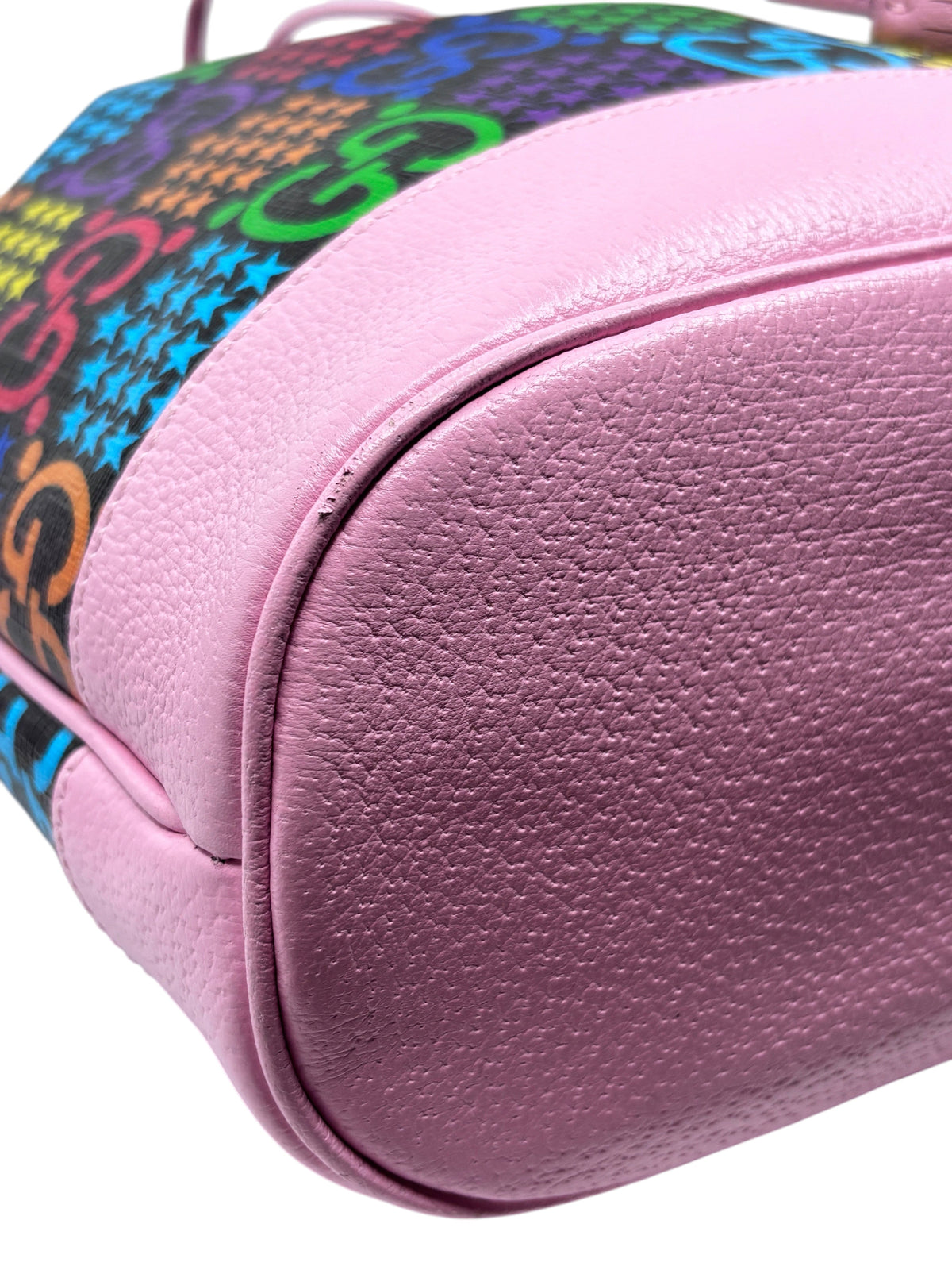 Posh Purse Co. Gucci GG Psychedelic bucket bag in pink with textured leather base and vibrant monogram pattern
