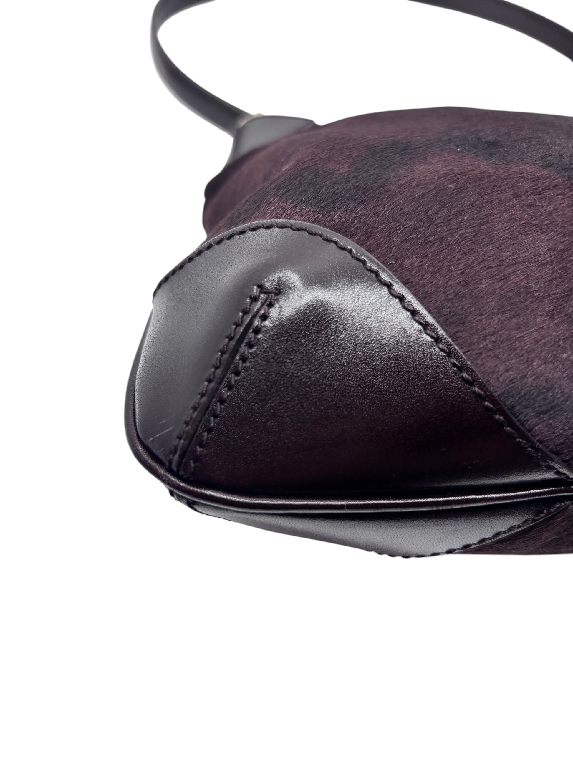 Posh Purse Co Gucci shoulder bag featuring dark purple pony hair texture and smooth leather trim detail