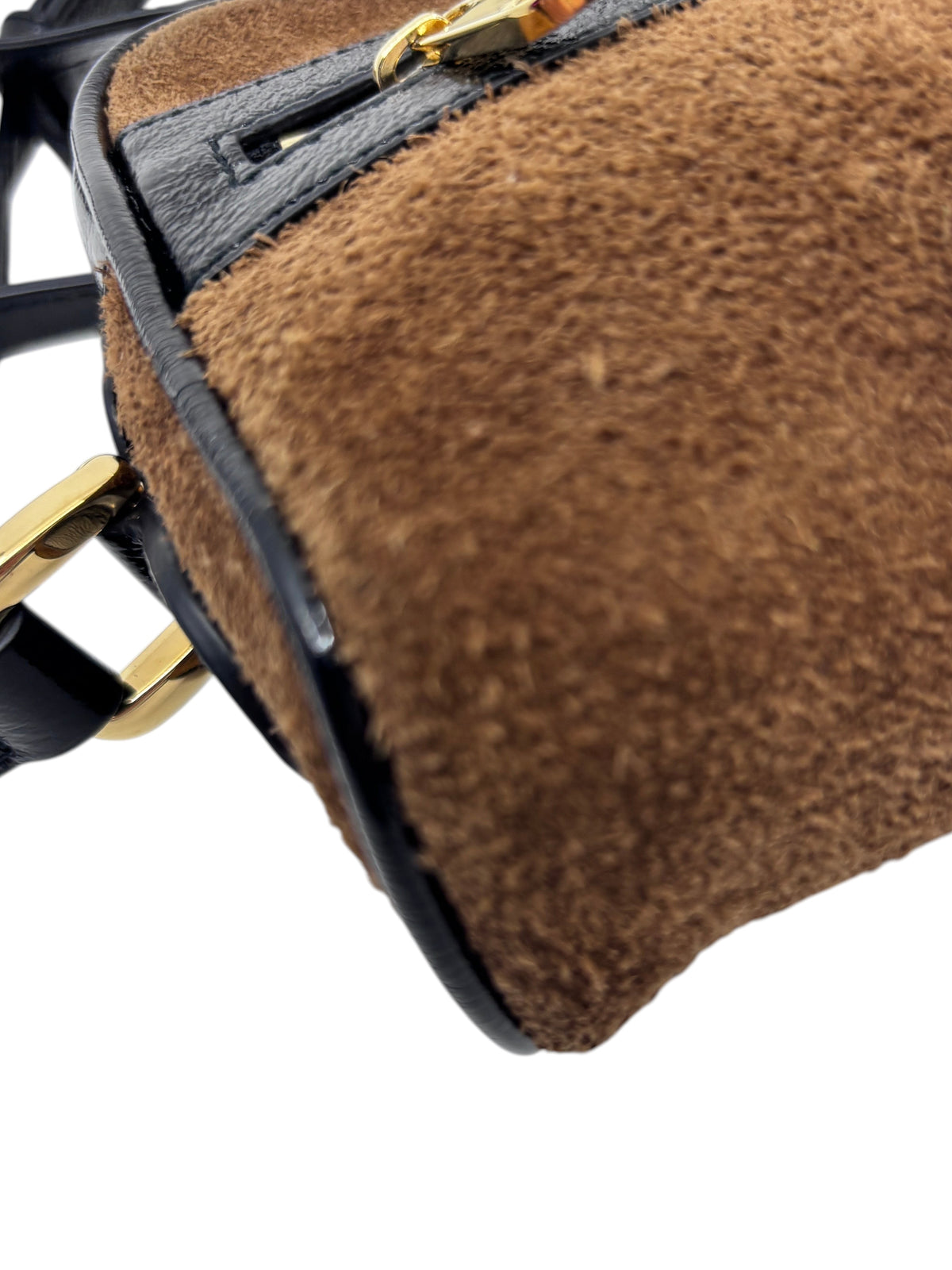 Close-up of Posh Purse Co Gucci Ophidia shoulder bag in brown suede with black leather trim and gold hardware.