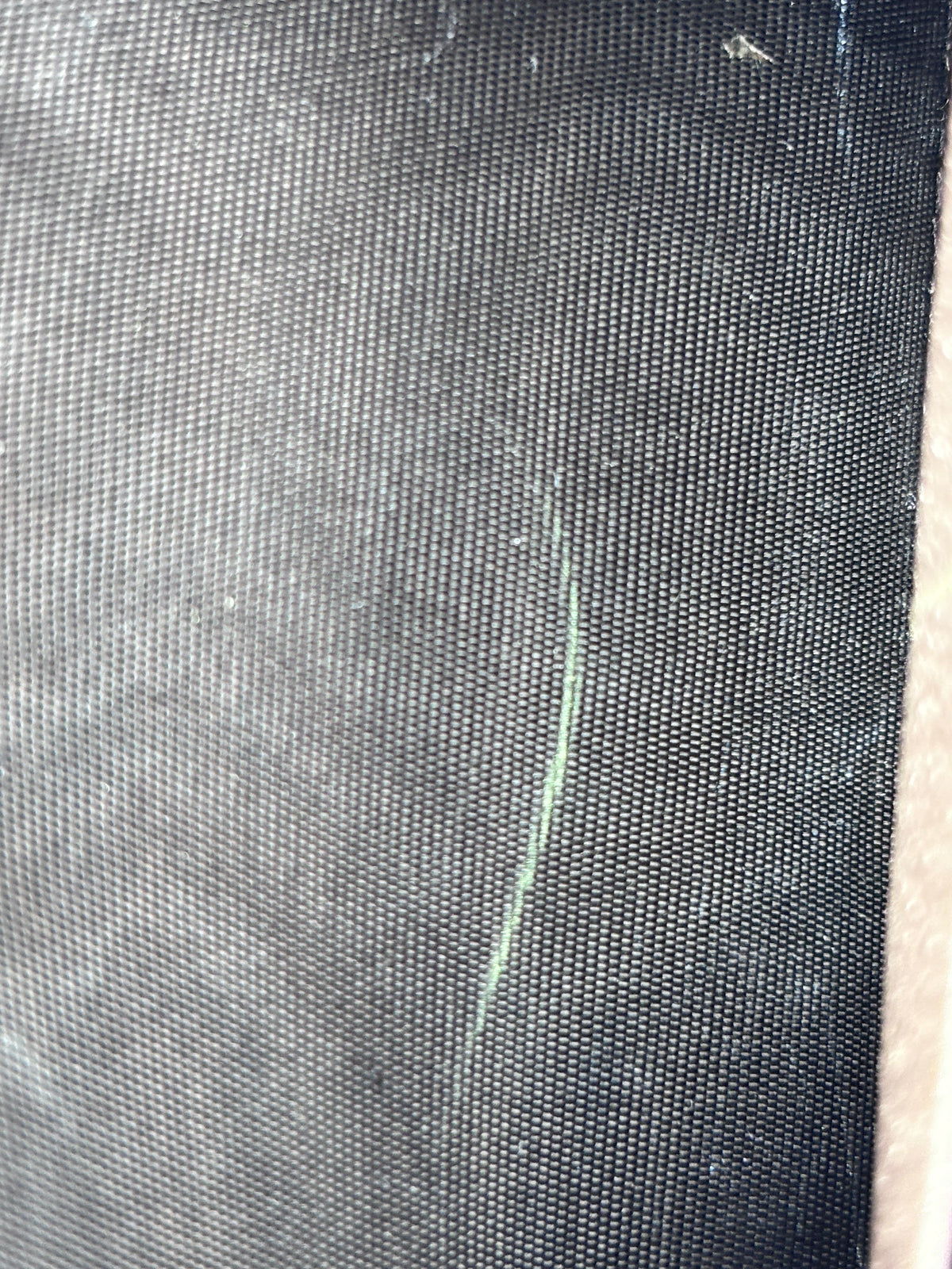 Close-up of minor interior staining on the Posh Purse Co. preloved Gucci monogram wallet on chain fabric lining
