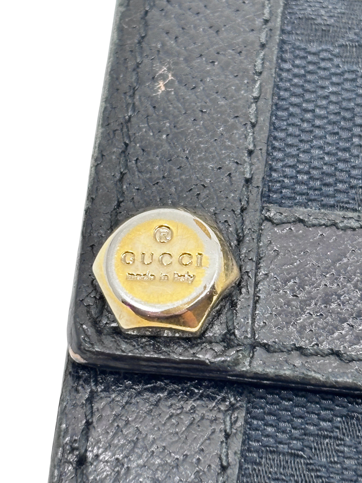 Posh Purse Co. preloved Gucci black continental wallet featuring signature gold-tone hardware detail
