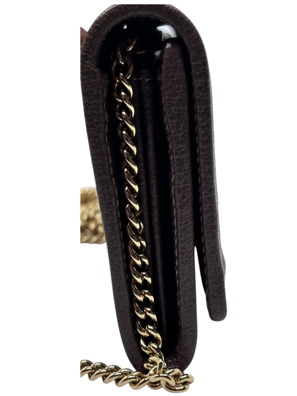 Side view of a Posh Purse Co. preloved Gucci monogram wallet on chain featuring a gold-tone metal shoulder strap.