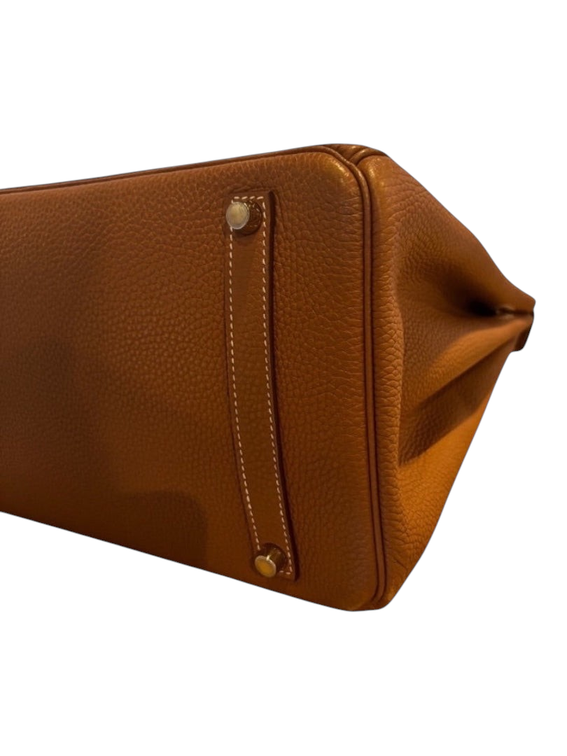 Posh Purse Co. Hermès Birkin 35 in gold Togo leather with gold hardware, side view showing textured leather detail.