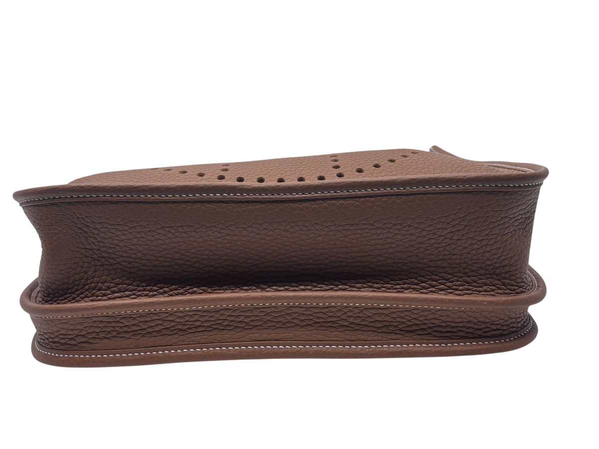 Posh Purse Co Hermès Evelyne bag in gold leather with signature perforated H motif and white contrast stitching