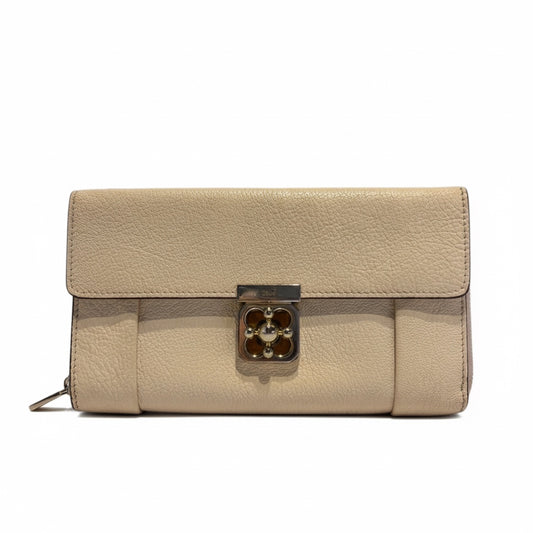 Posh Purse Co. ivory leather Chloé Elise wallet with silver clasp and organized interior.