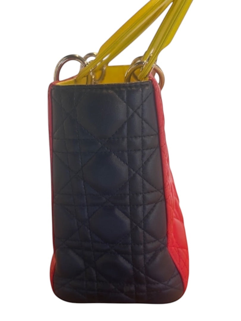 Posh Purse Co Lady Dior multicolor cannage leather handbag with yellow handles and red trim. Features quilted stitching and gold-tone hardware.