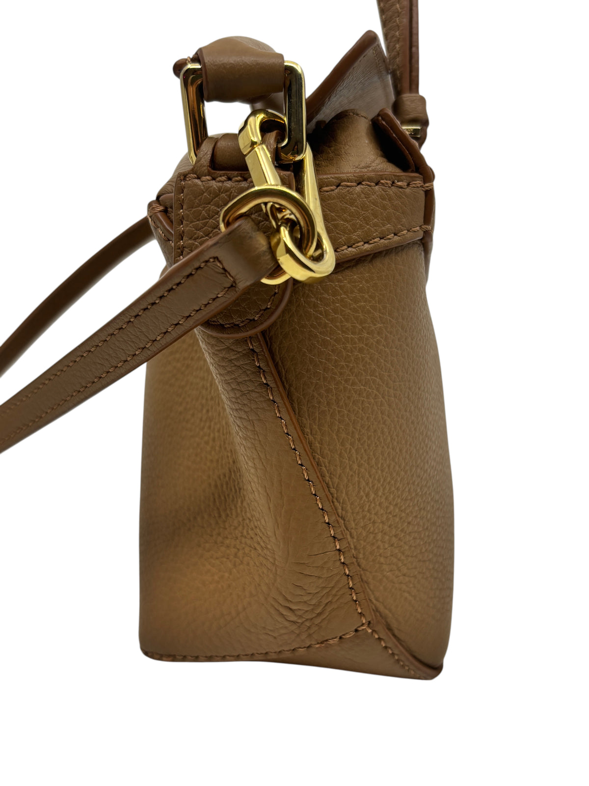 Posh Purse Co Loewe Mini Puzzle bag side view in brown pebbled leather with gold hardware and shoulder strap
