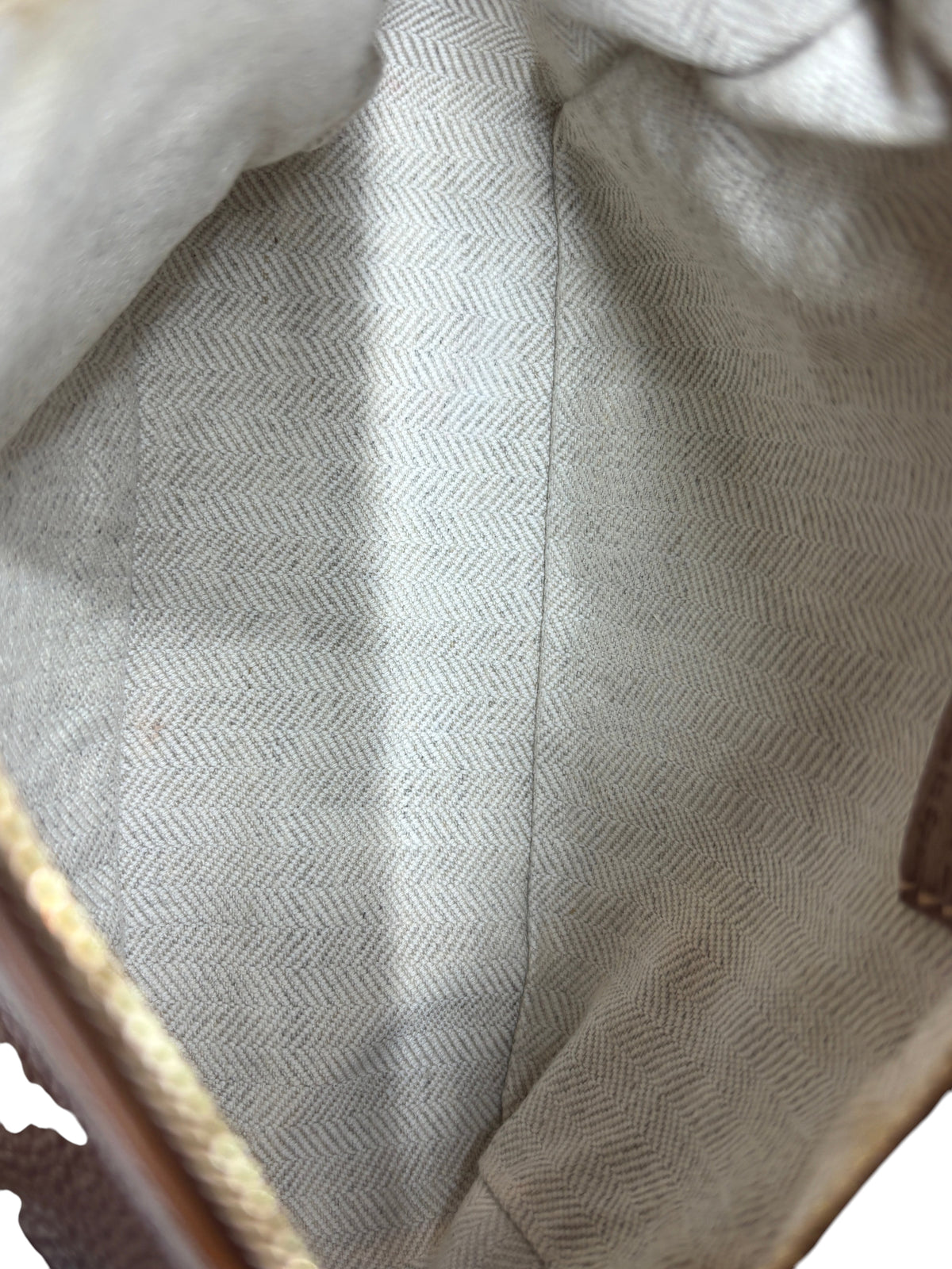 Posh Purse Co Loewe Mini Puzzle Bag interior featuring beige herringbone fabric lining