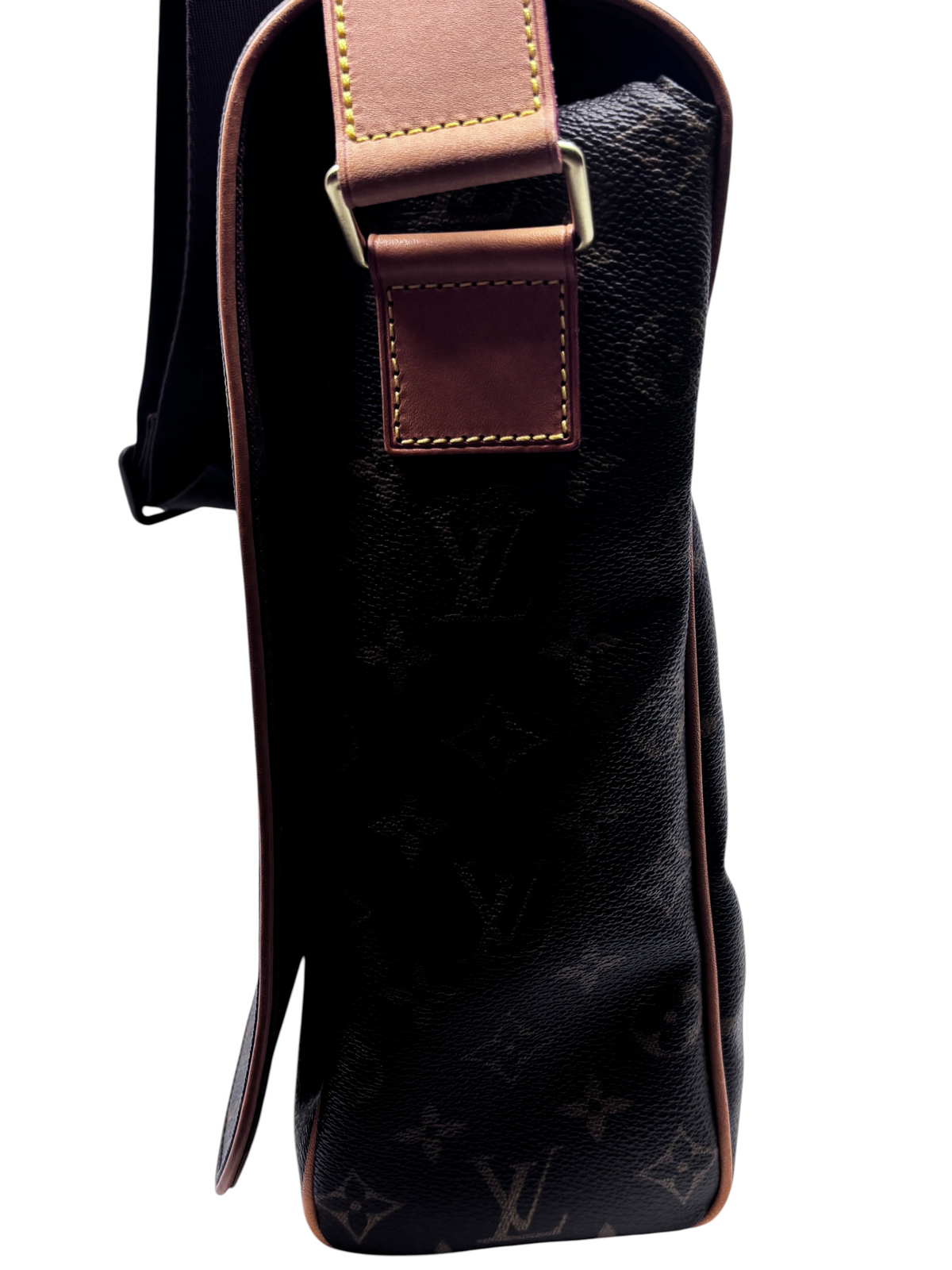 Posh Purse Co Louis Vuitton Monogram Abbesses messenger bag side view with natural leather trim and adjustable strap