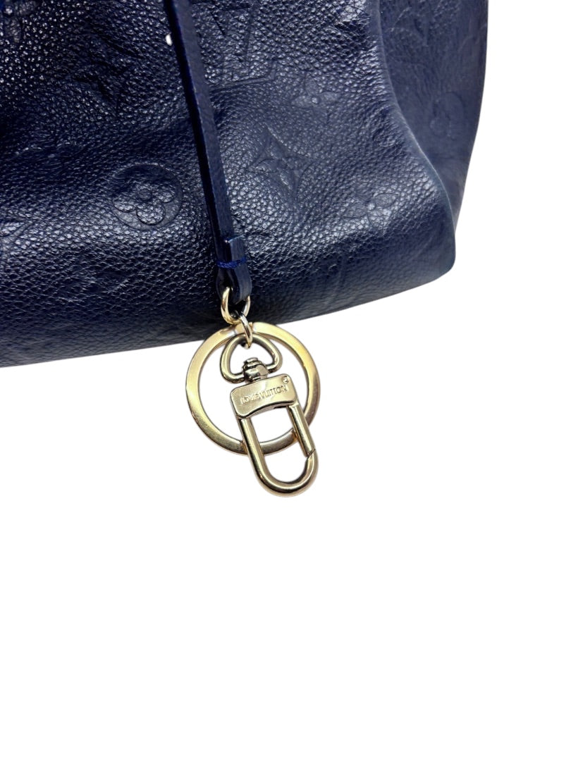 Posh Purse Co Louis Vuitton Artsy MM handbag in marine navy blue embossed leather with gold-tone hardware charm