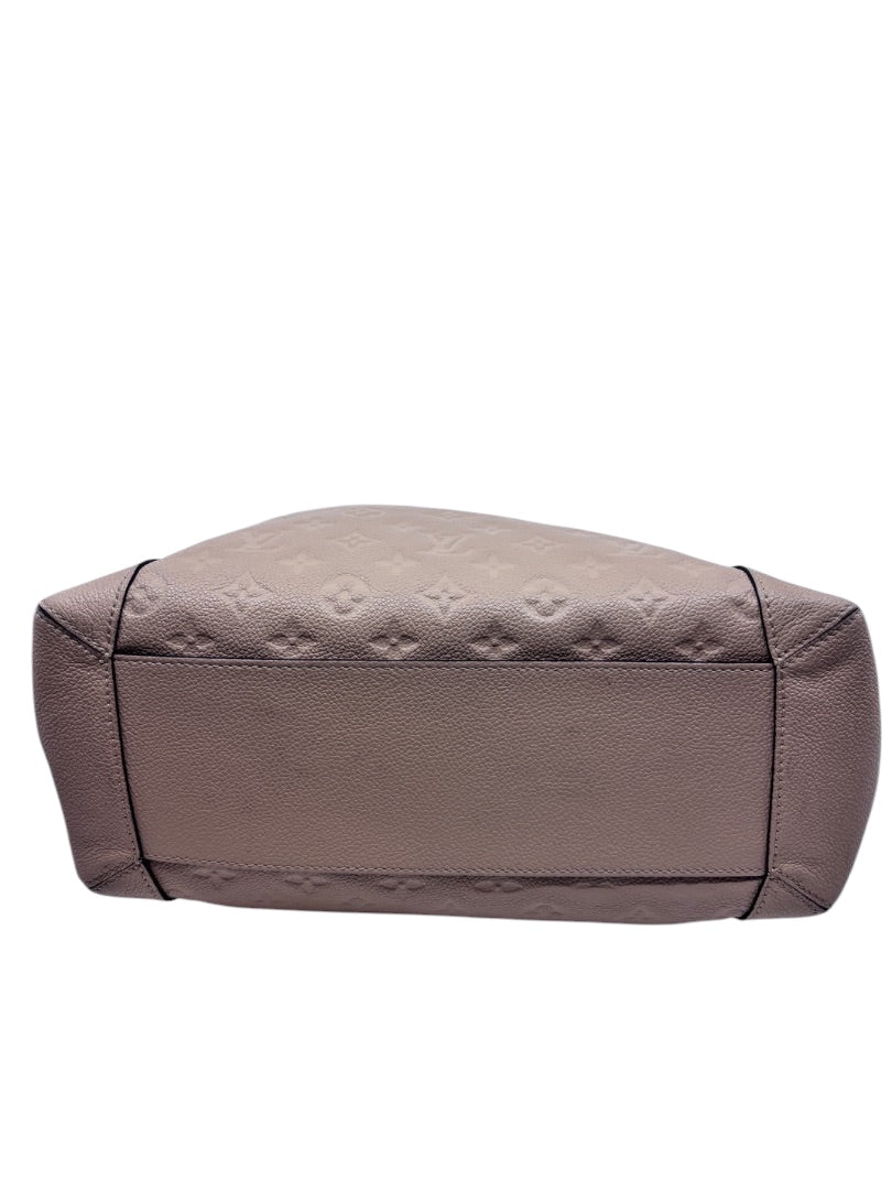 Posh Purse Co tan Louis Vuitton Empreinte Bagatelle hobo bag base view showing embossed monogram leather texture