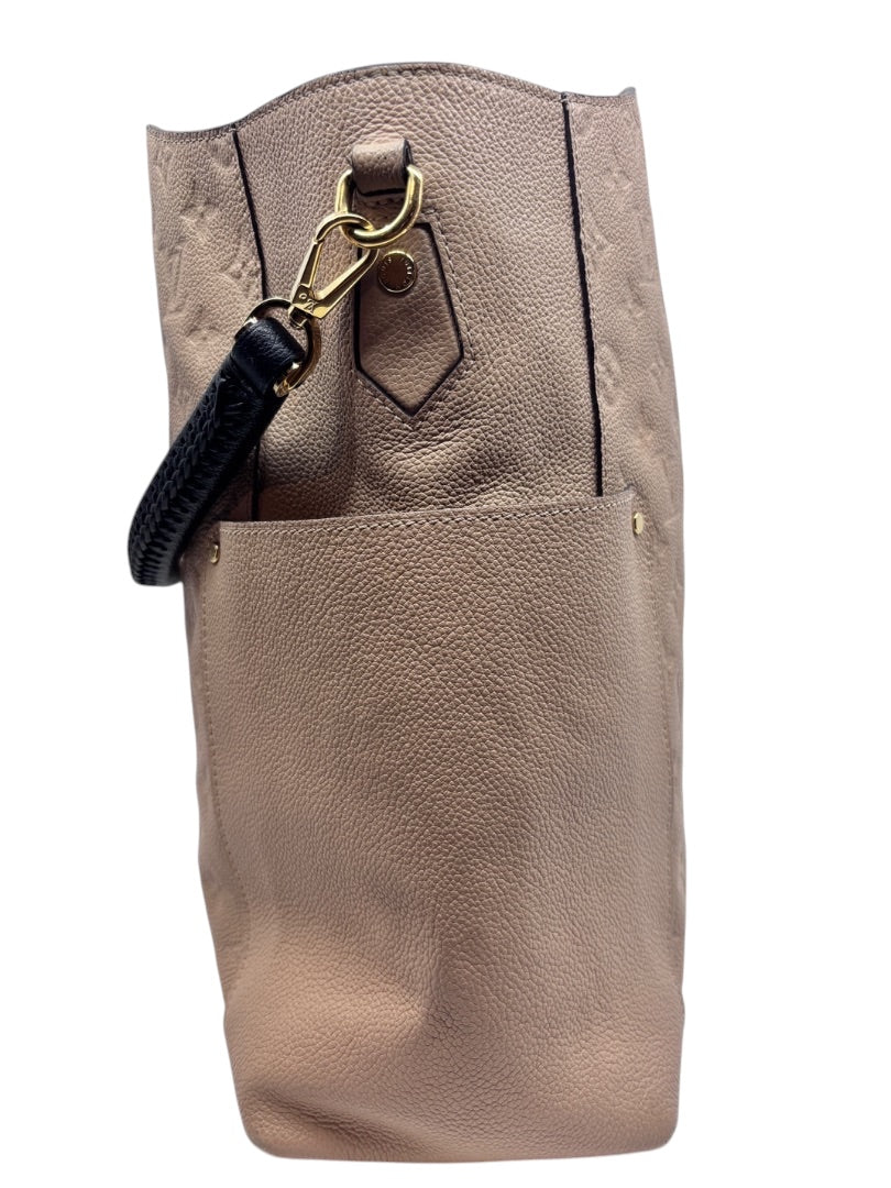 Posh Purse Co tan Louis Vuitton Empreinte Bagatelle hobo bag side view with gold hardware and black leather strap
