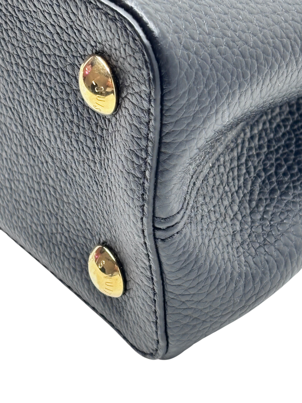 Posh Purse Co black Louis Vuitton Capucines MM handbag featuring textured leather and polished gold hardware studs