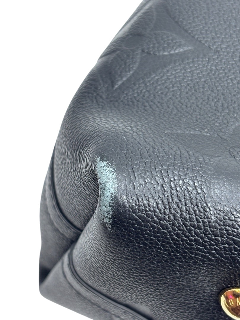 Posh Purse Co black Louis Vuitton CarryAll handbag showing minor corner wear on the textured leather exterior