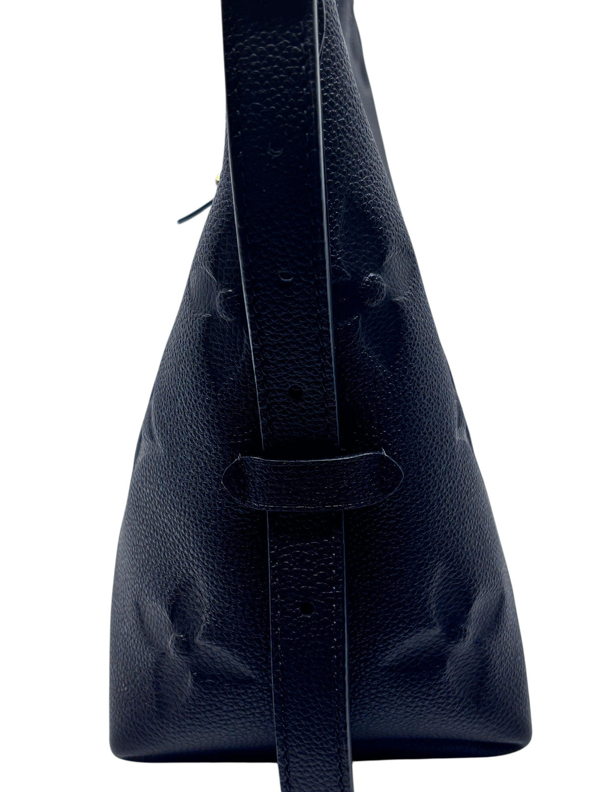 Posh Purse Co black Louis Vuitton CarryAll PM handbag side view showing textured leather and adjustable strap