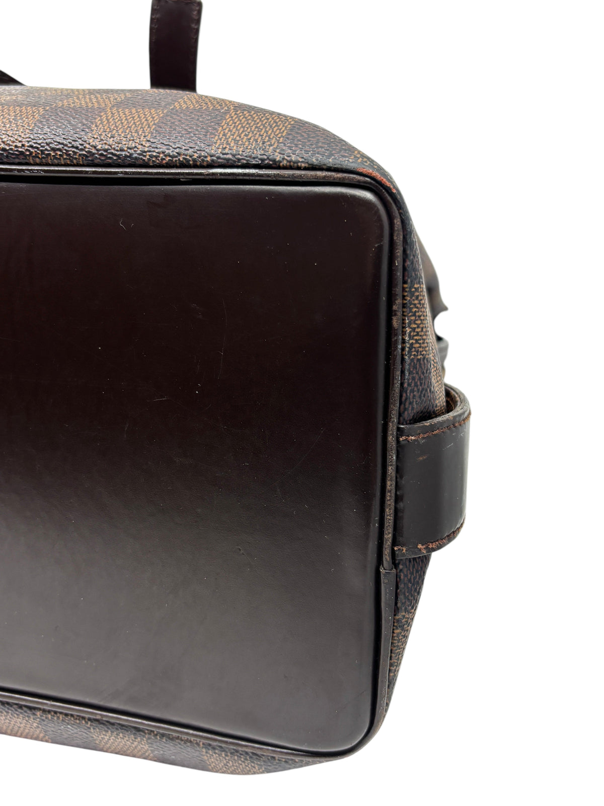 Posh Purse Co. Louis Vuitton Chelsea Tote base showing brown leather trim and Damier Ebene coated canvas detail