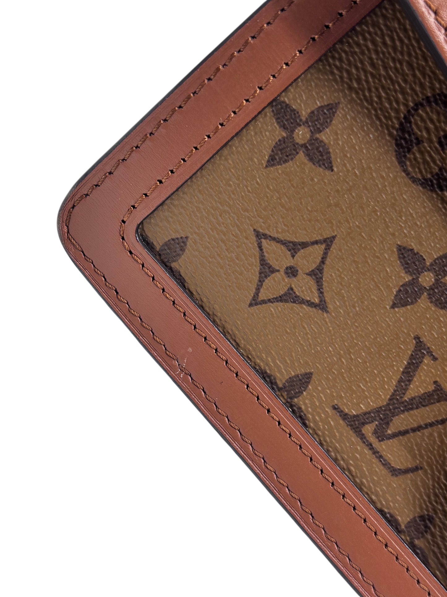 Posh Purse Co. Louis Vuitton Dauphine MM featuring brown Monogram Reverse coated canvas and smooth cowhide leather trim.