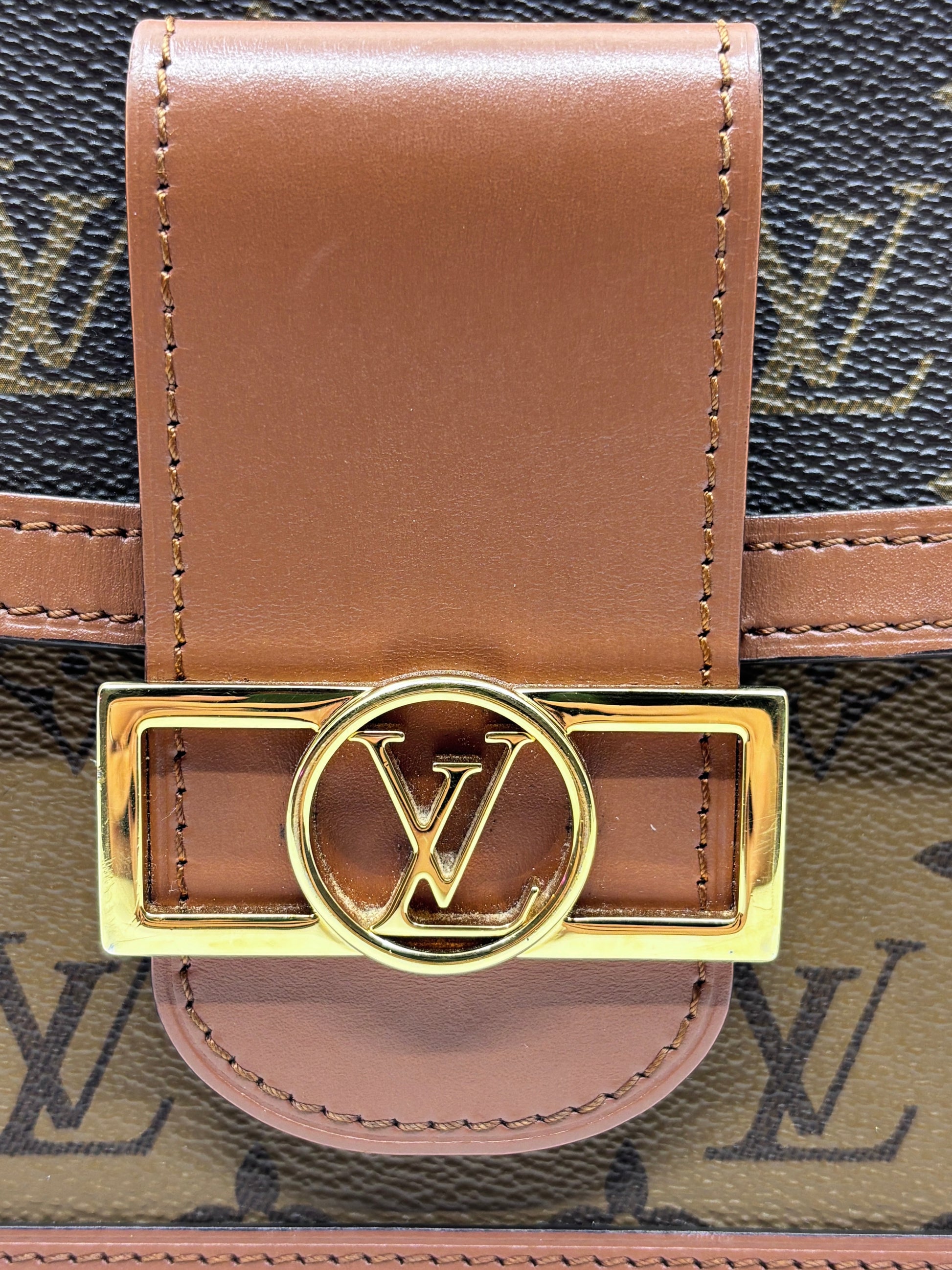 Posh Purse Co Louis Vuitton Dauphine MM bag featuring gold-tone LV Circle magnetic closure and brown leather trim.