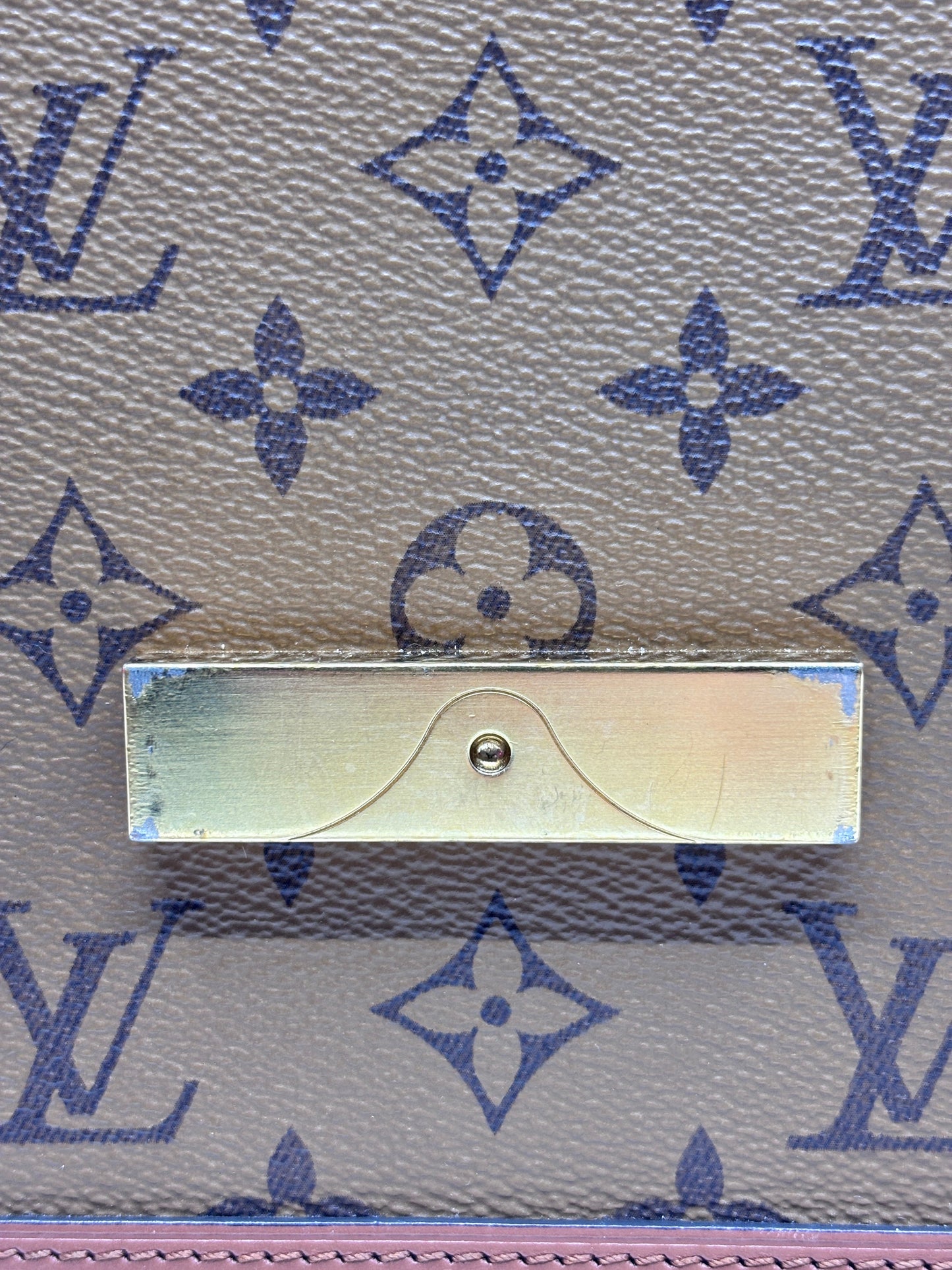 Posh Purse Co. Louis Vuitton Dauphine MM bag featuring the iconic Reverse Monogram canvas and gold-tone LV hardware.