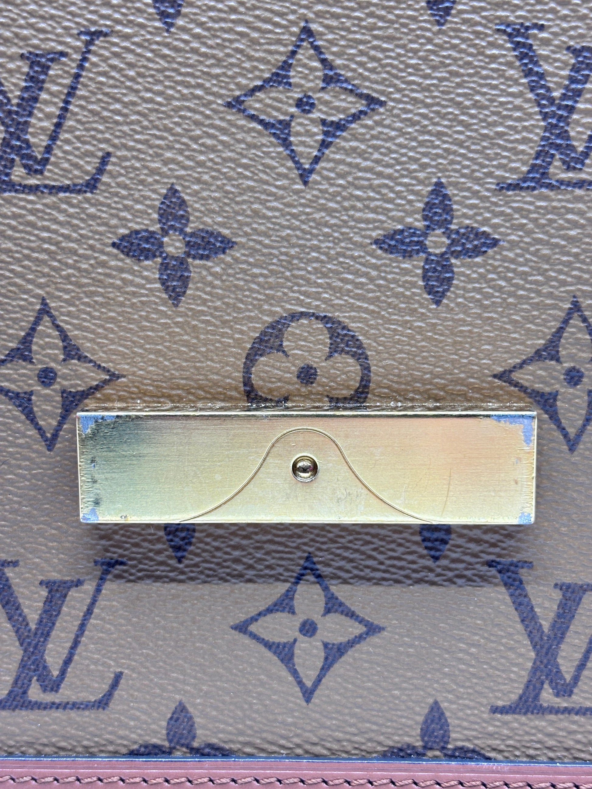 Posh Purse Co. Louis Vuitton Dauphine MM bag featuring the iconic Reverse Monogram canvas and gold-tone LV hardware.