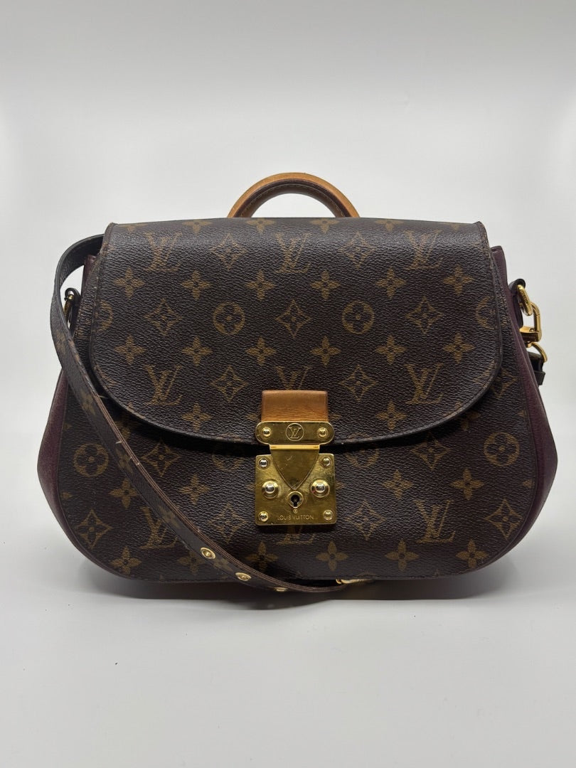 Louis Vuitton Eden MM bag in brown Monogram canvas with leather trim and gold hardware from Posh Purse Co.