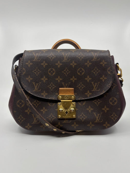 Louis Vuitton Eden MM bag in brown Monogram canvas with leather trim and gold hardware from Posh Purse Co.