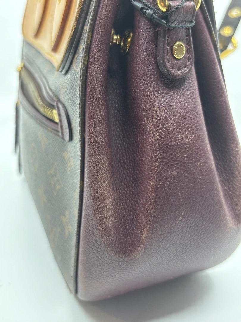 Posh Purse Co. Louis Vuitton Eden MM bag featuring brown monogram canvas, burgundy leather side panels, and gold hardware