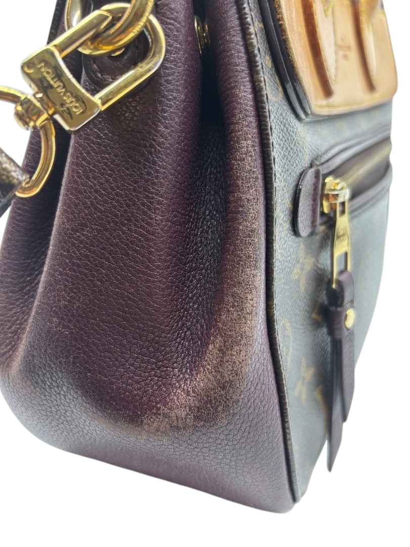 Posh Purse Co. preloved Louis Vuitton Eden MM bag featuring brown monogram canvas, dark leather trim, and gold hardware.