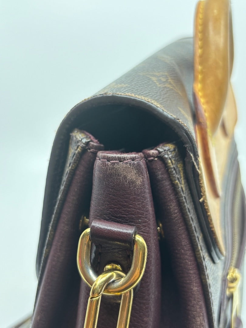 Posh Purse Co. preloved Louis Vuitton Eden MM bag in brown Monogram canvas with dark leather trim and gold hardware.