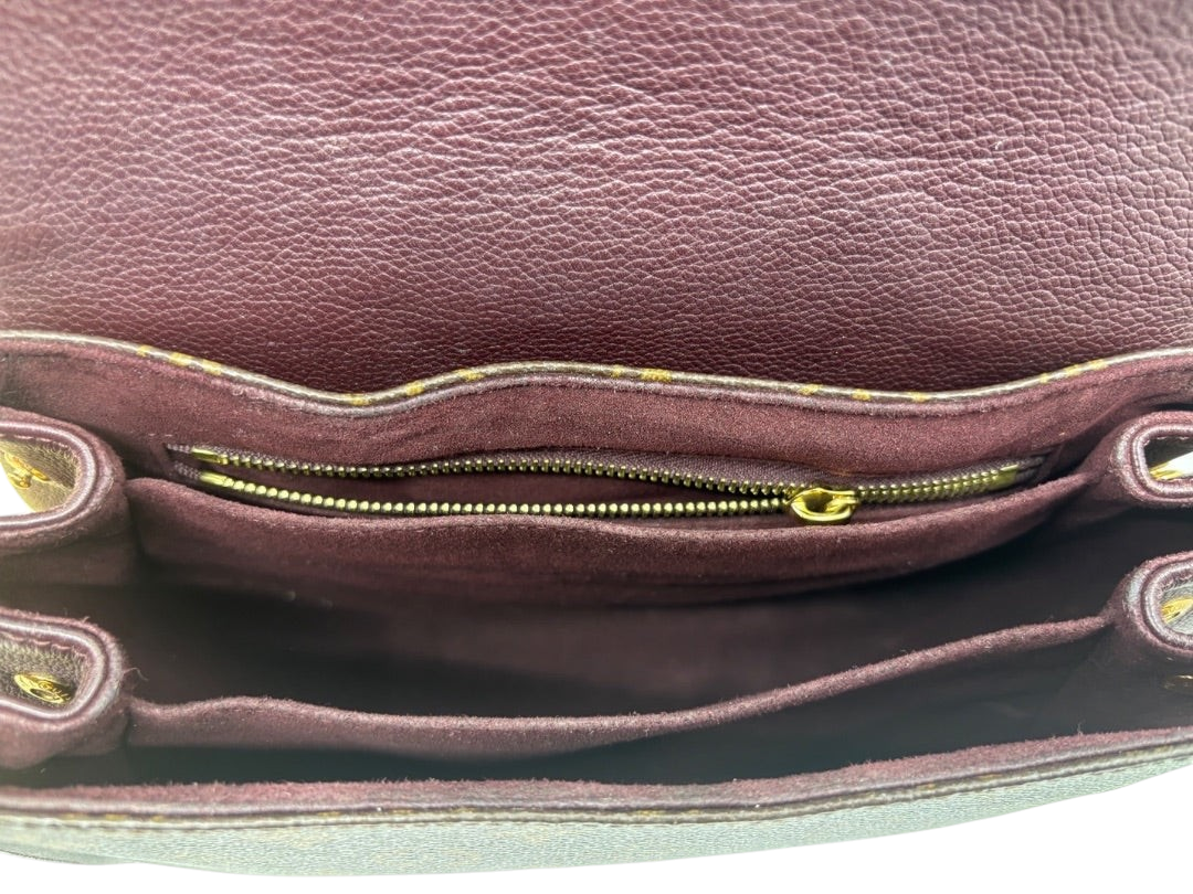 Interior of Posh Purse Co. Louis Vuitton Eden MM bag featuring deep burgundy suede lining and gold-tone zipper pocket.