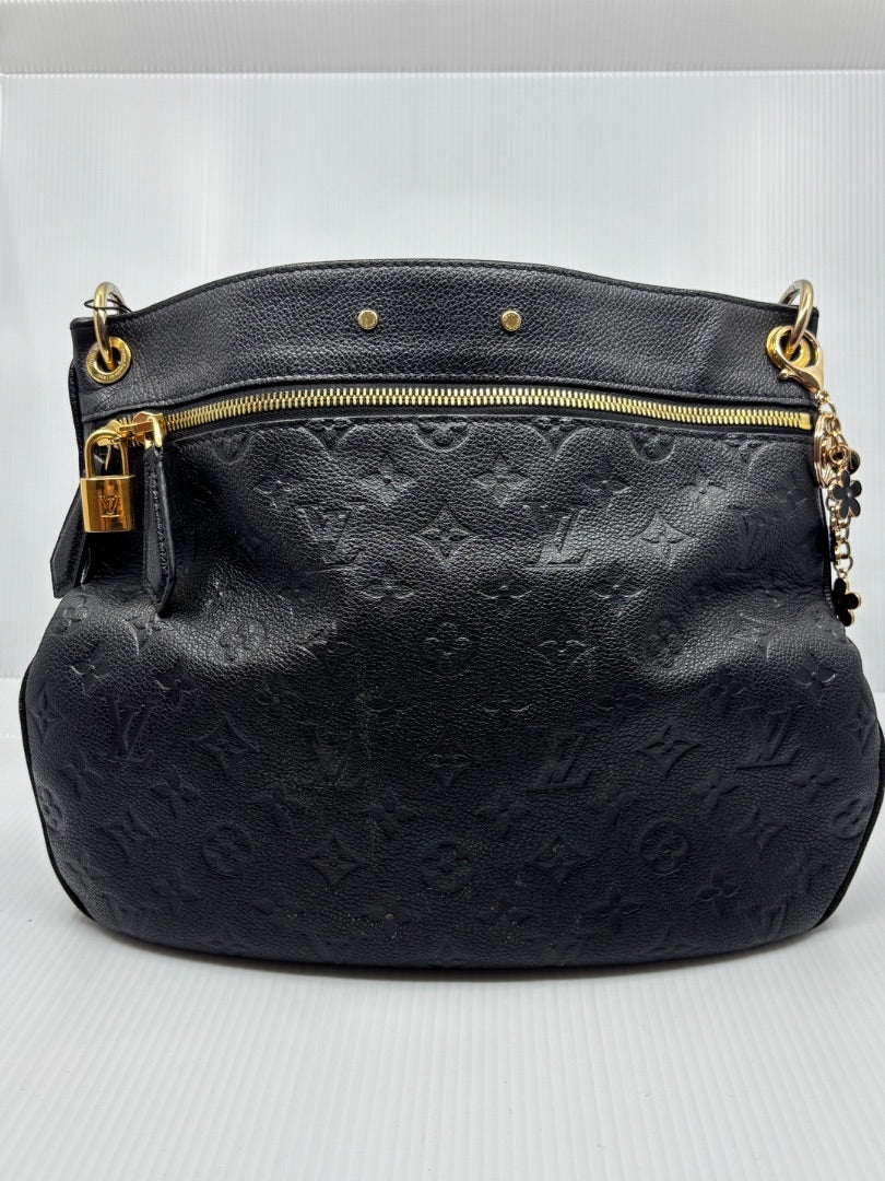 Black Louis Vuitton Monogram Empreinte Spontini handbag with gold hardware, available at Posh Purse Co.