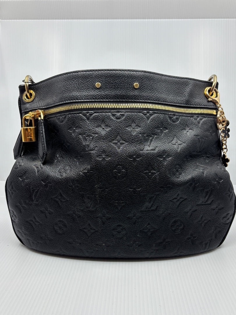 Black Louis Vuitton Monogram Empreinte Spontini handbag with gold hardware, available at Posh Purse Co.