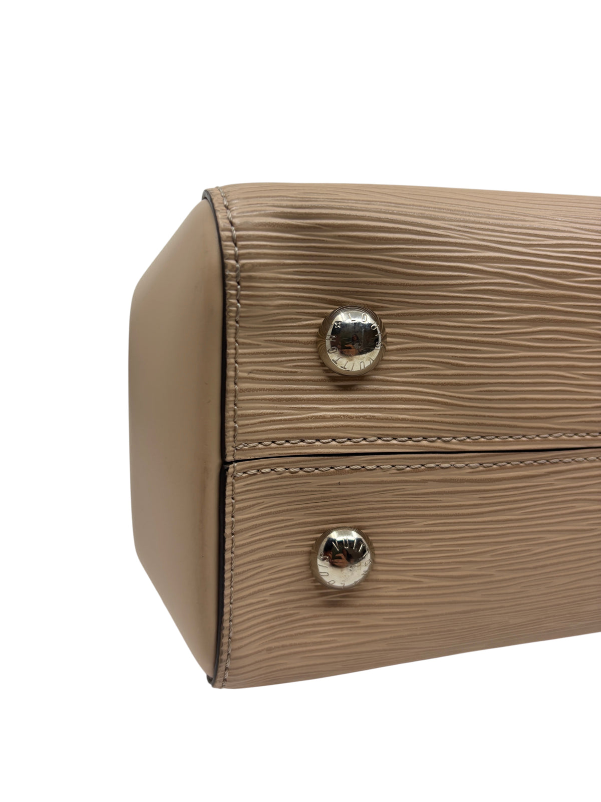 Posh Purse Co. Louis Vuitton Cluny MM handbag base showing beige Epi leather texture and protective silver metal feet