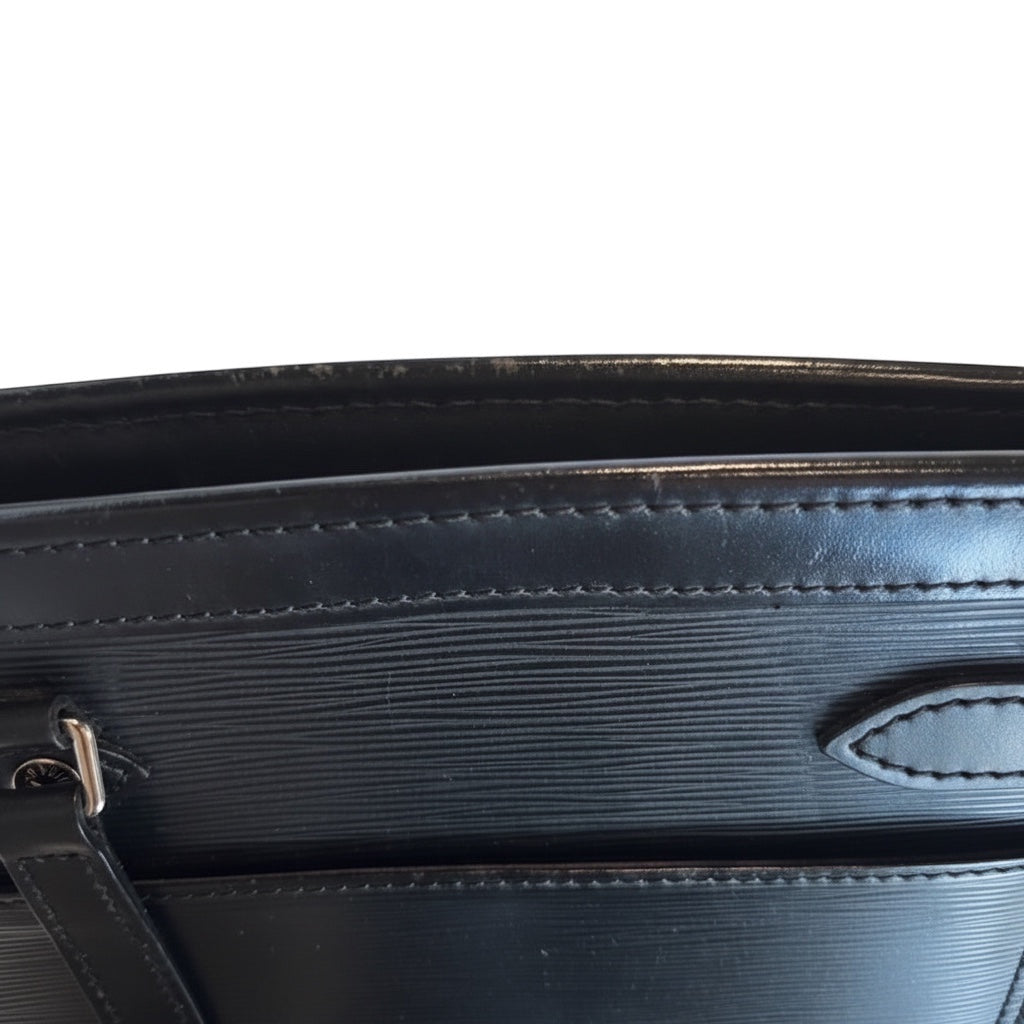 Posh Purse Co. black Louis Vuitton Epi leather Madeleine handbag with textured finish and silver hardware.
