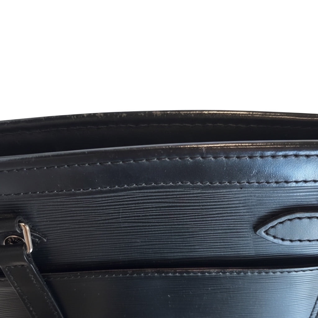 Posh Purse Co. black Louis Vuitton Epi leather Madeleine handbag with textured finish and silver hardware.